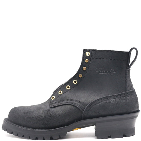 Black leather boot with a white background