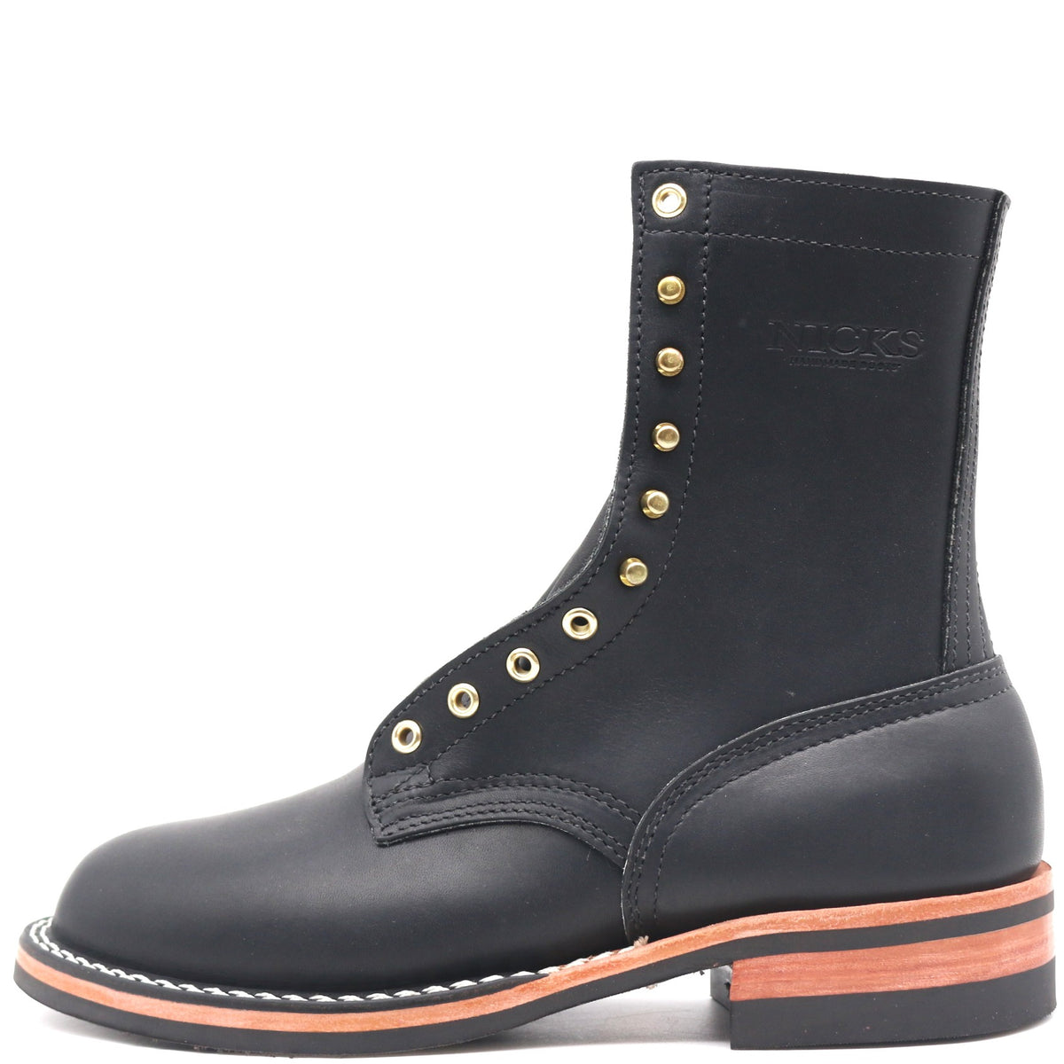 A black leather lace-up boot with gold-tone metal eyelets, a stacked black sole, and a contrasting light brown midsole layer, shown against a plain white background.