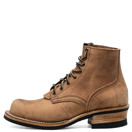 A single brown leather lace-up ankle boot with a rugged sole and stacked heel, shown from a side profile on a white background.